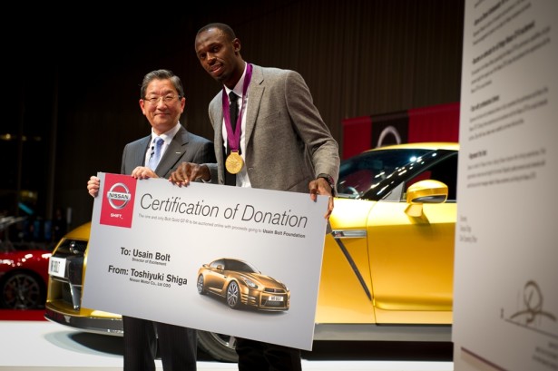 COO Toshiyuki Shiga and Usain Bolt at Nissan HQ.