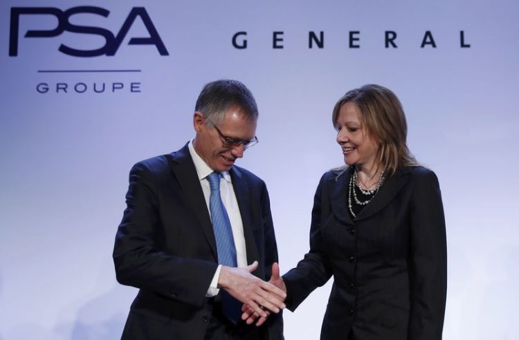 Carlos Tavares (PSA) e Mary Barra (GM)