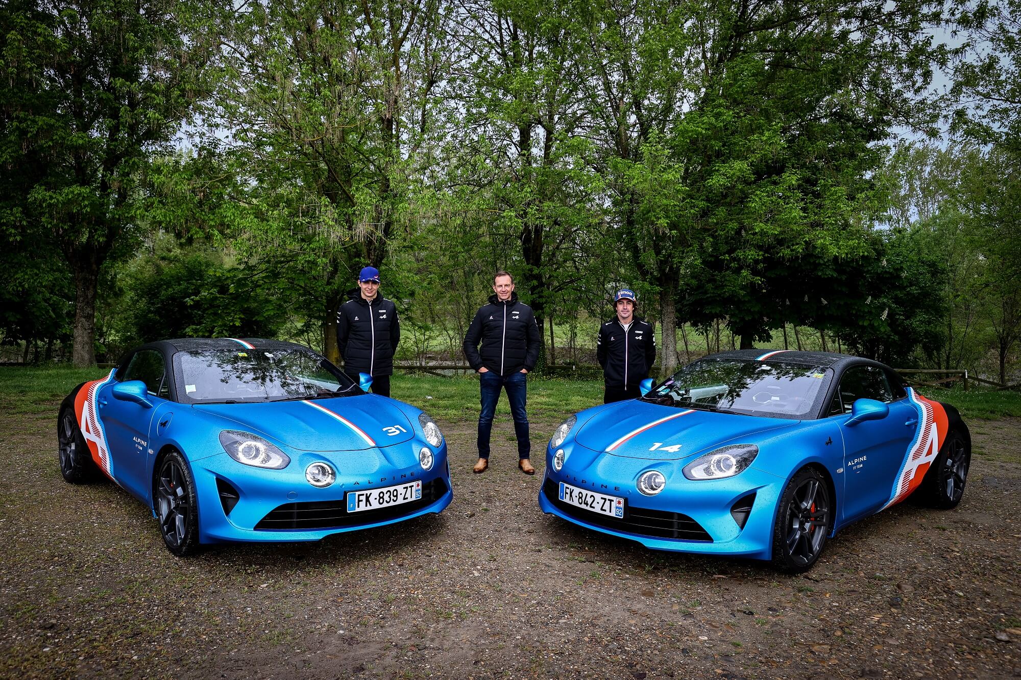 Esteban Ocon, Laurent Rossi e Fernando Alonso,