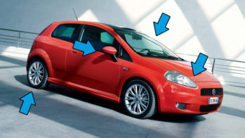 Fiat Grand Punto com setas a indicar áreas a verificar para inspeção