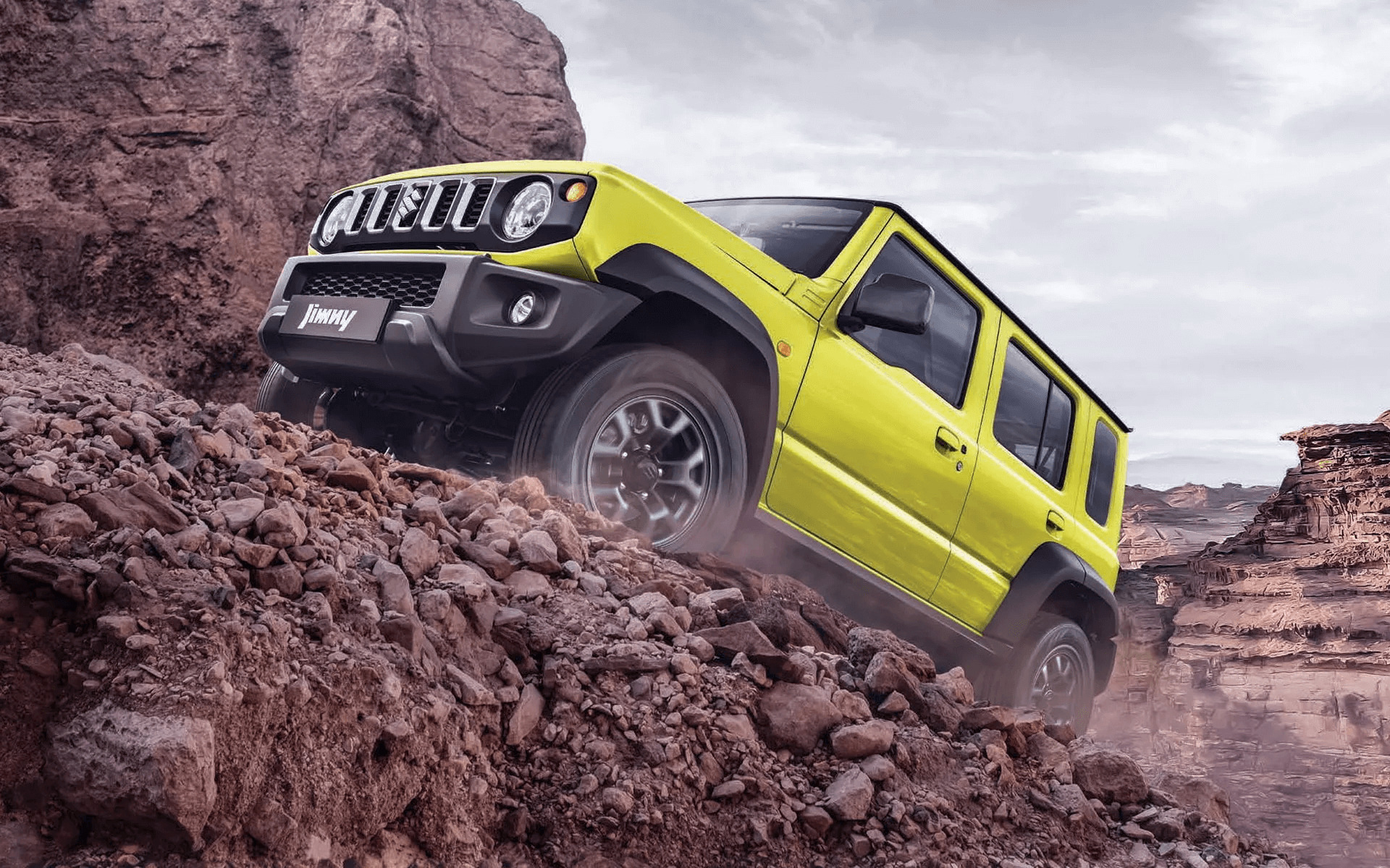 suzuki jimny a subir estrada terra, frente 3/4