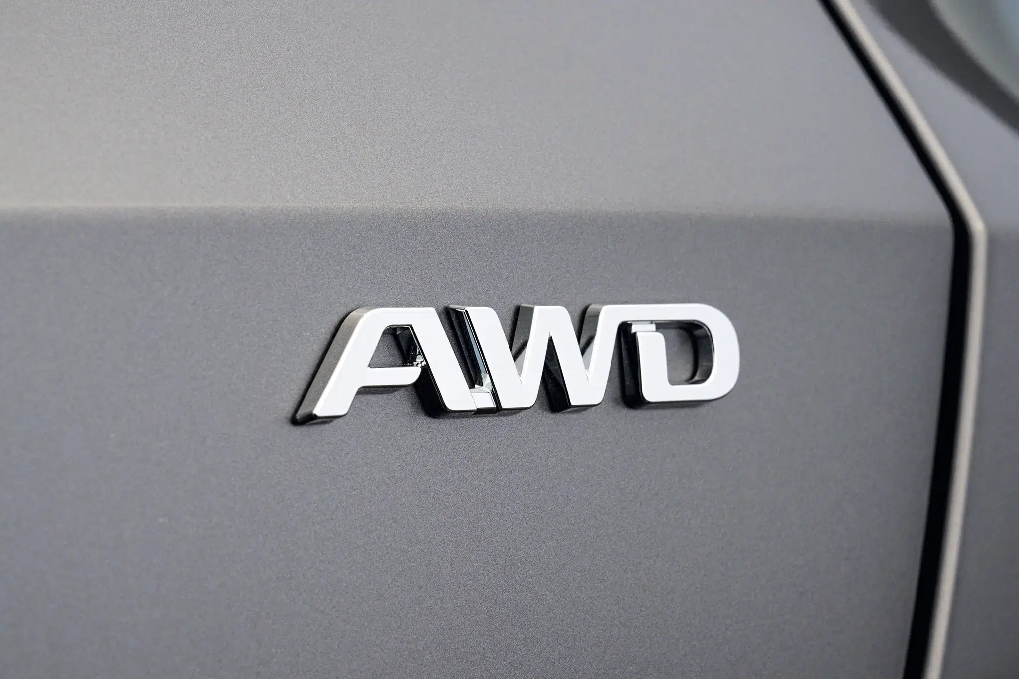 Toyota bZ4X - logo AWD