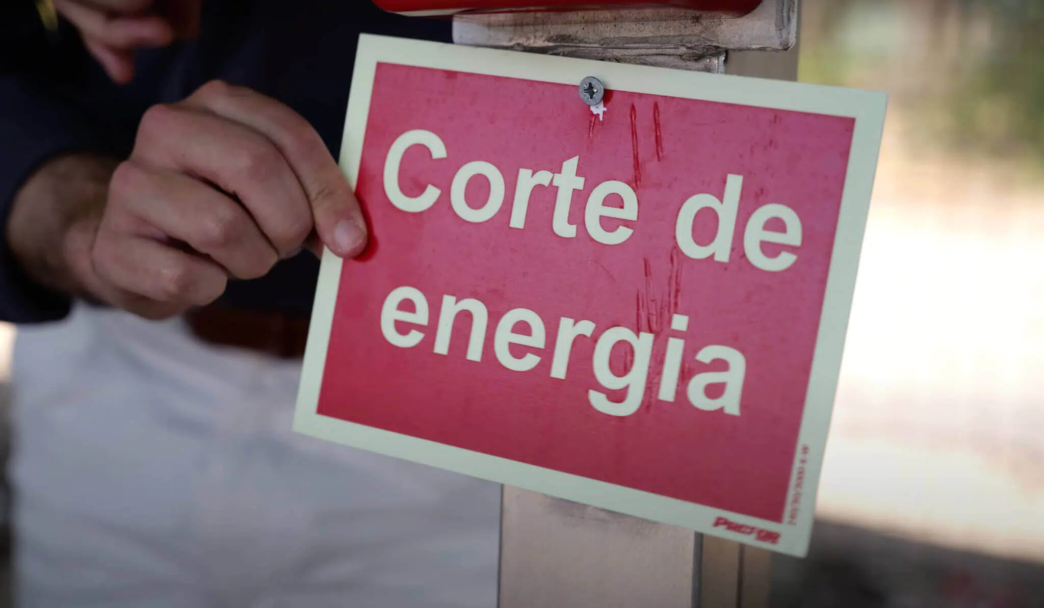 Placa a dizer Corte de Energia