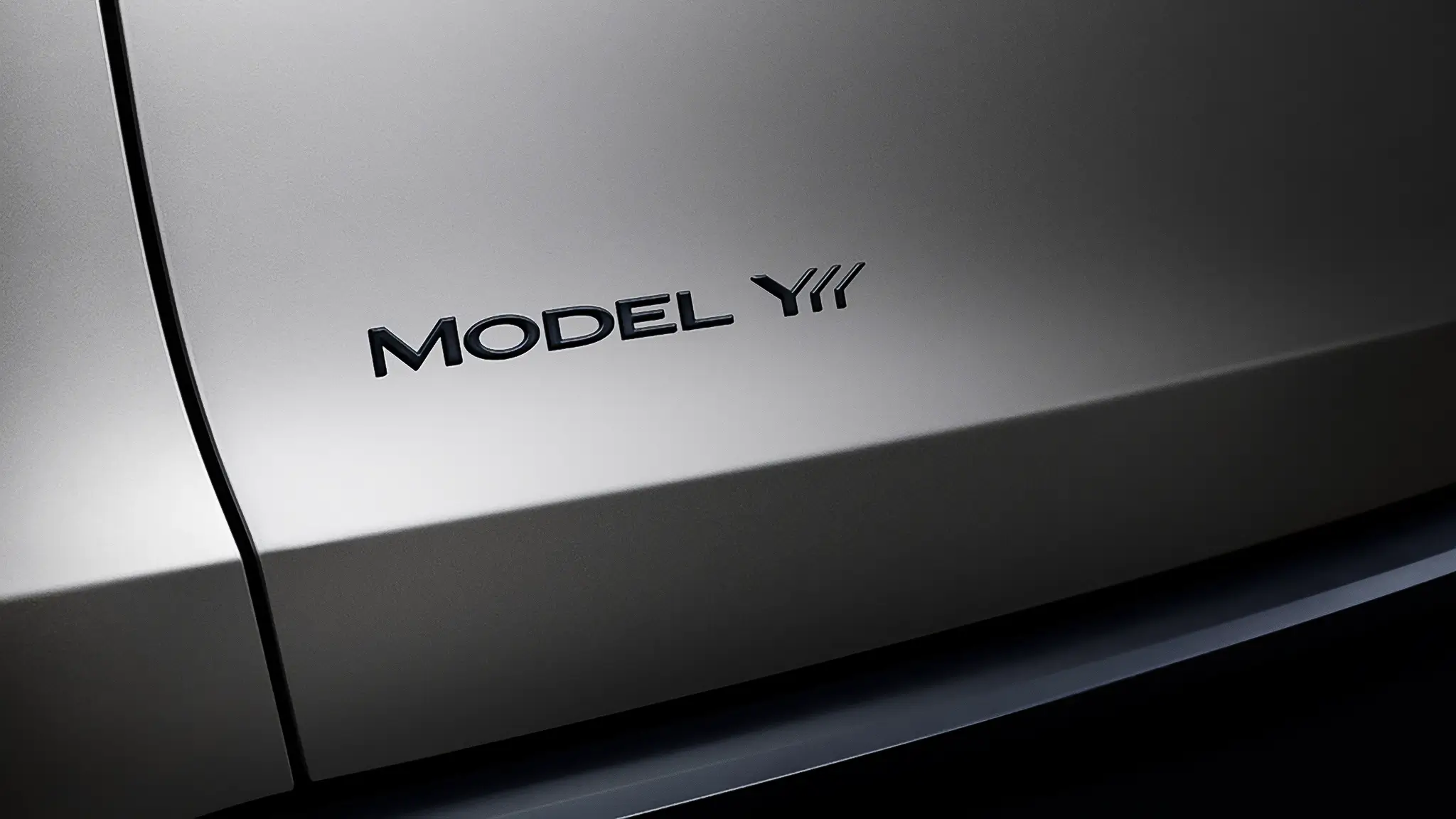Tesla Model Y L - teaser logo